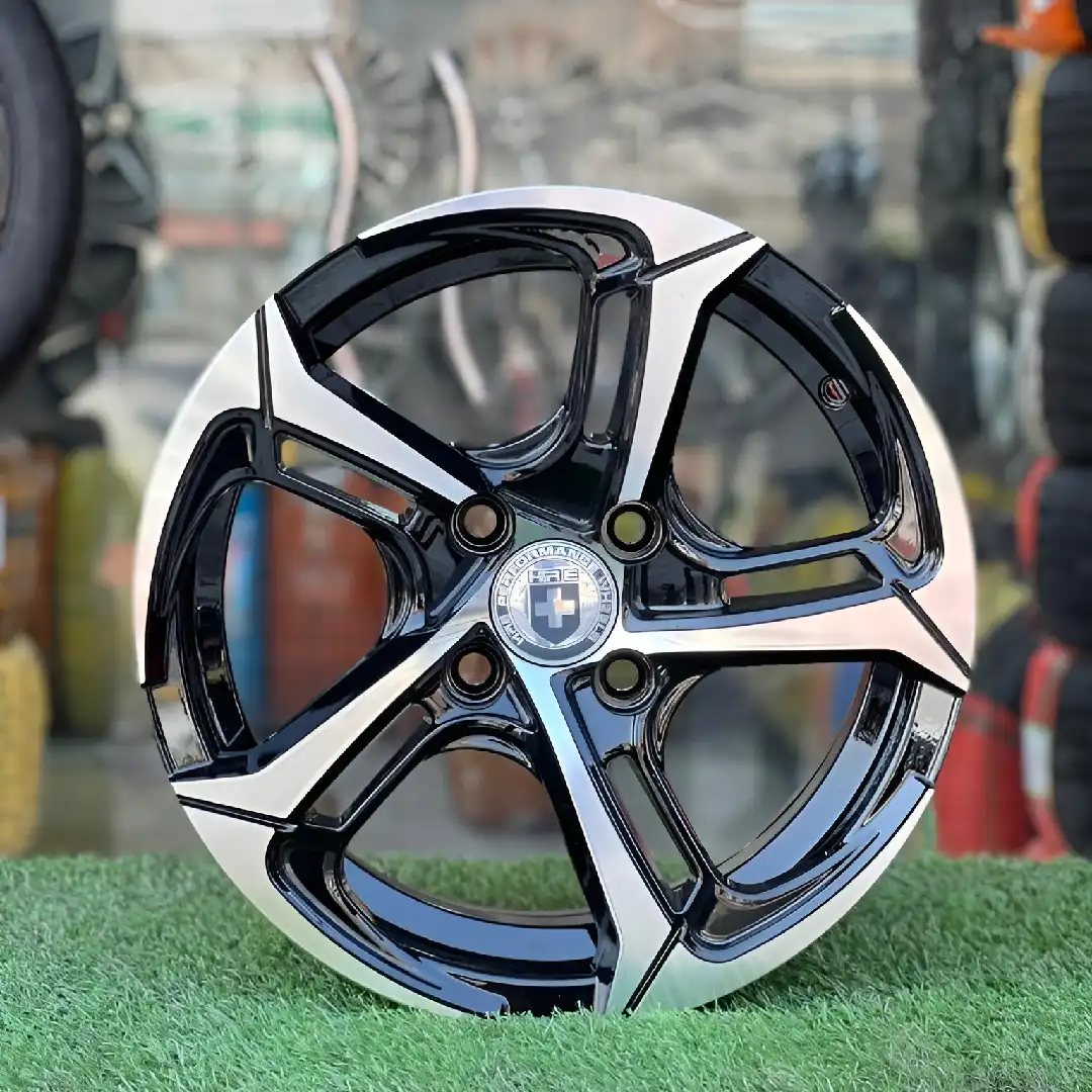 14 Inch Aftermarket Black and White Velocity Alloy Rim (1) 14 Inch Aftermarket Black and White Velocity Alloy Rim